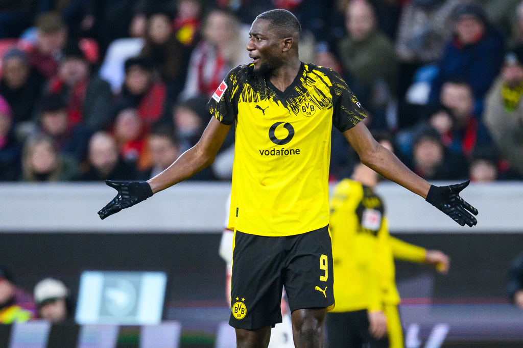 Dortmund's Serhou Guirassy reacts during the German Bundesliga soccer match between SC Freiburg and Borussia Dortmund in Freiburg, Germany, Sunday, Dec. 14, 2025. (Tom Weller/dpa via AP)