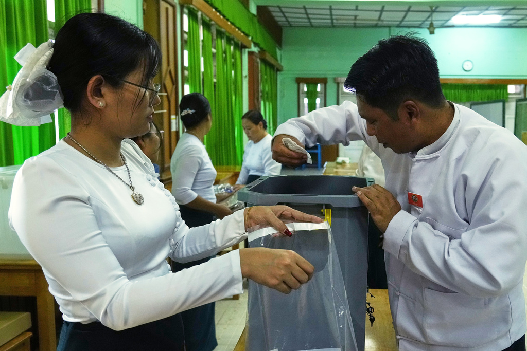 Official of the Union Election Commission prepare to close a polling station after the votes are counted, during the first phase of general election, in Naypyitaw, Myanmar, Sunday, Dec. 28, 2025. (AP Photo/Aung Shine Oo)
