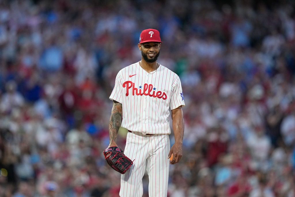 Philadelphia Phillies pitcher Cristopher Sánchez reacts after giving up a run-scoring single to San Diego Padres' Jackson Merrill during the seventh inning of a baseball game Wednesday, June 3, 2026, in Philadelphia. (AP Photo/Matt Slocum)