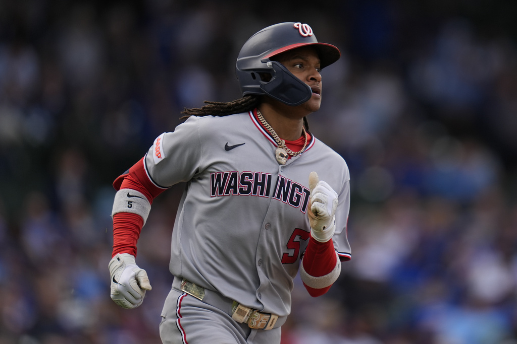 Washington Nationals' CJ Abrams runs the to first after hitting a single during the sixth inning of a baseball game against the Chicago Cubs, Friday, Sept. 5, 2025, in Chicago. (AP Photo/Erin Hooley)