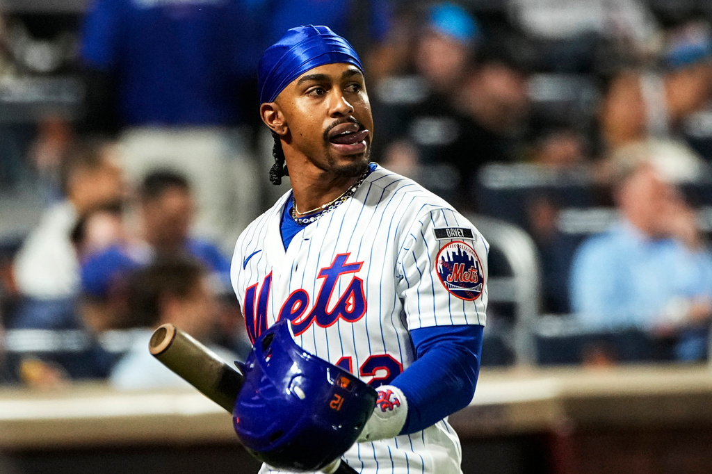 New York Mets Francisco Lindor (12) reacts after being called out during the fifth inning of a baseball game against the Baltimore Orioles, Wednesday, Sept. 16, 2026, in New York. (AP Photo/Eduardo Munoz Alvarez)