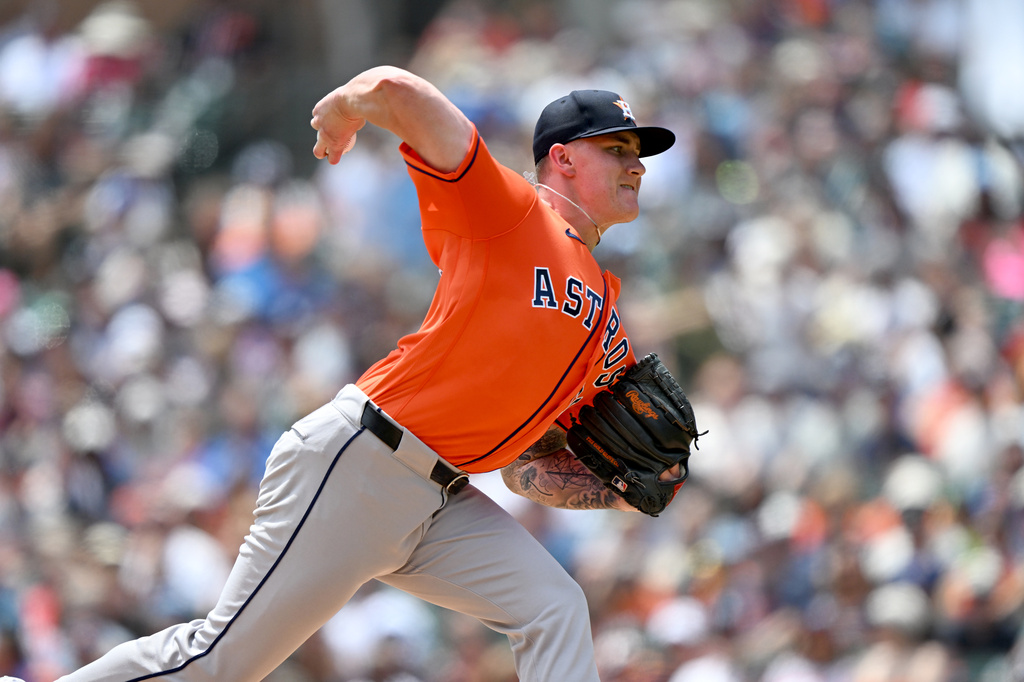 Houston Astros starting pitcher Hunter Brown throws against the Detroit Tigers in the first inning of a baseball game, Sunday, June 28, 2026, in Detroit. (AP Photo/Lon Horwedel)