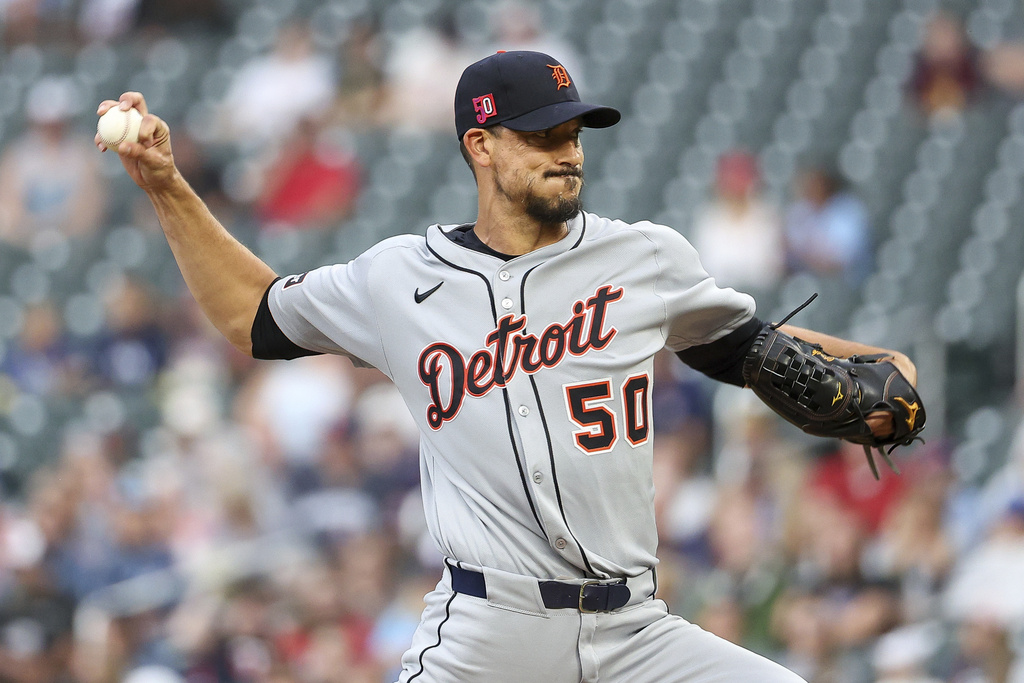 Detroit Tigers starting pitcher Charlie Morton (50) delivers against the Minnesota Twins during the first inning of a baseball game Friday, Aug. 15, 2025, in Minneapolis. (AP Photo/Matt Krohn)