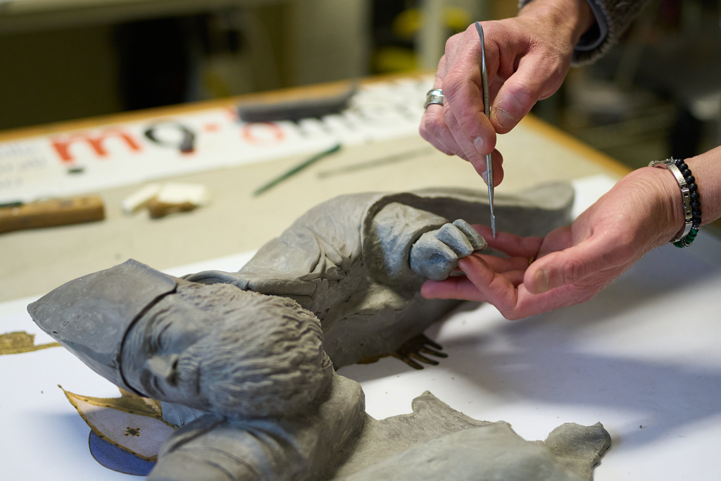 Massimiliano Trubbiani, an expert in tactile education for blind and visually impaired people, works to transform Titian's Pala Gozzi into bas-relief in a laboratory at the Omero Tactile Museum in Ancona, Italy, Friday, Jan. 16, 2026. (AP Photo/Alessandra Tarantino)
