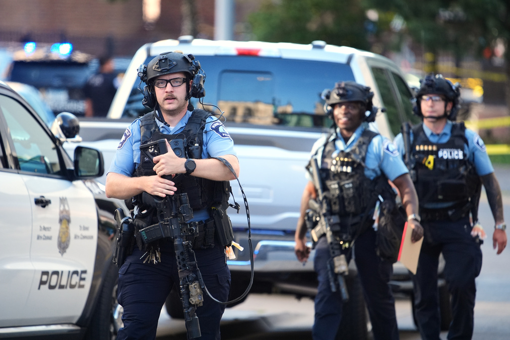 Police respond to a shooting Wednesday, Sept. 2, 2026, in downtown Minneapolis. (AP Photo/Ellen Schmidt)