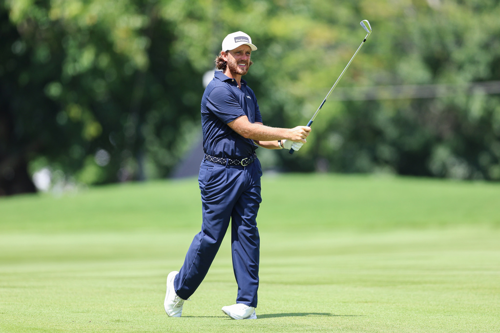 Tommy Fleetwood plays a shot on the first hole during the second round of the Tour Championship golf tournament, Friday, Aug. 28, 2026, in Atlanta. (AP Photo/Colin Hubbard)