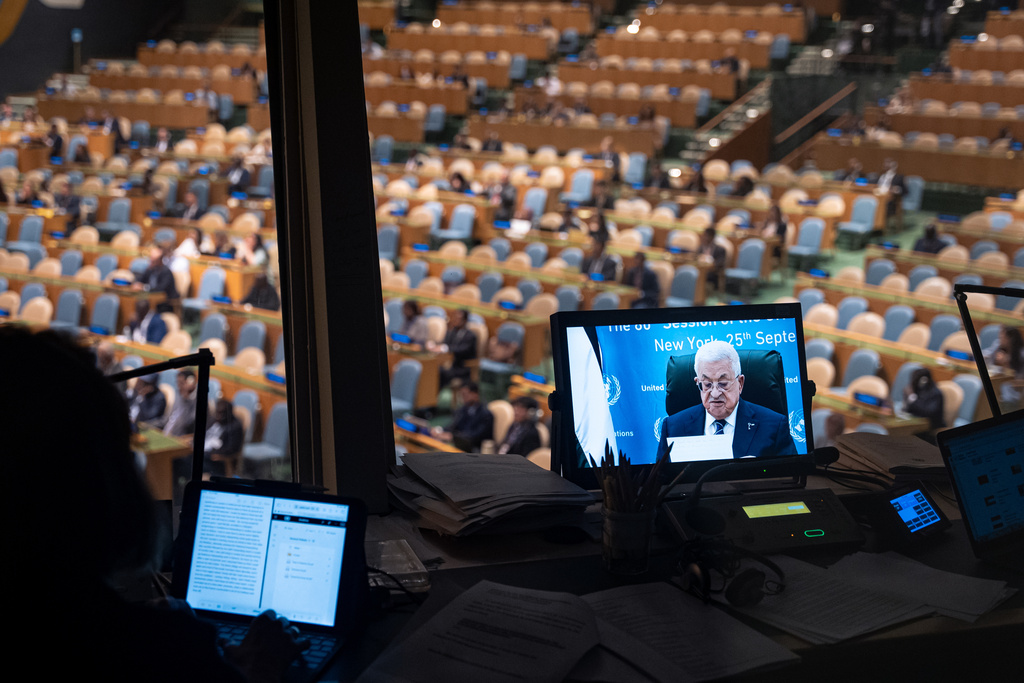 Palestinian President Mahmoud Abbas address the 80th session of the United Nations General Assembly via video at United Nations headquarters, Thursday, Sept. 25, 2025. (AP Photo/Angelina Katsanis)