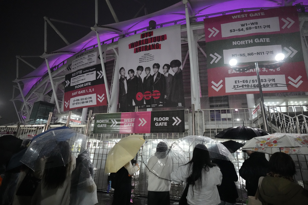 Fans of K-pop band BTS gather outside of the stadium where K-pop band BTS is performing the World Tour Arirang in Goyang, South Korea, Thursday, April 9, 2026. (AP Photo/Lee Jin-man)