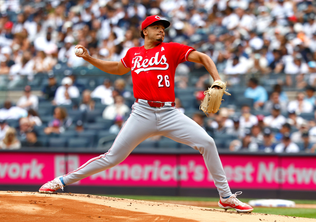 Cincinnati Reds pitcher Chase Burns throws against the New York Yankees during the first inning of a baseball game, Sunday, June 21, 2026, in New York. (AP Photo/Noah K. Murray)