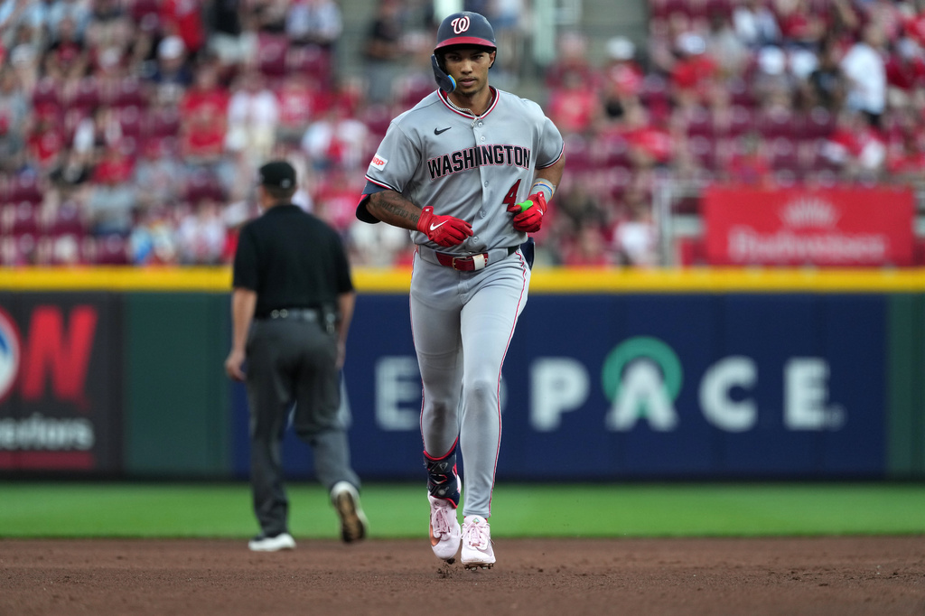 Washington Nationals' Daylen Lile rounds the bases after hitting a solo home run during the fourth inning of a baseball game against the Cincinnati Reds, Tuesday, May 12, 2026, in Cincinnati. (AP Photo/Kareem Elgazzar)