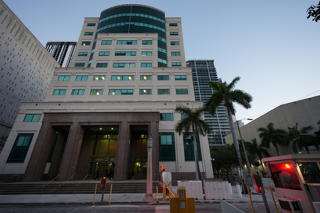 The sun rises outside the James Lawrence King Federal Building, where Secretary of State Marco was expected to testify in the trial of his former roommate David Rivera, Tuesday, March 24, 2026, in Miami. (AP Photo/Rebecca Blackwell)