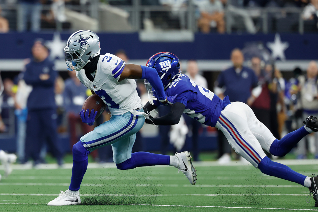 FILE - Dallas Cowboys wide receiver George Pickens (3) carries the ball after reception during a NFL football game against the New York Giants on Sept. 14, 2025, in Arlington, Texas. (AP Photo/Matt Patterson, File)