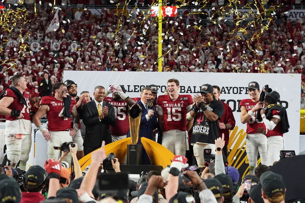 FILE - Indiana quarterback Fernando Mendoza (15) is interviewed during the trophy ceremony after Indiana defeated Miami in a College Football Playoff national championship game, Monday, Jan. 19, 2026, in Miami Gardens, Fla. (AP Photo/Lynne Sladky,File)