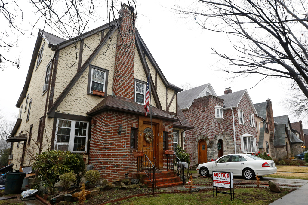FILE - The boyhood home of President-elect Donald Trump is seen on Jan. 17, 2017, in New York. (AP Photo/Kathy Willens, File)