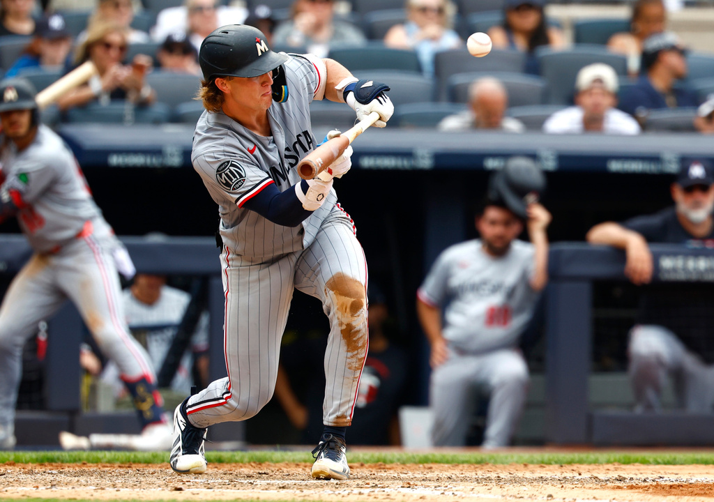 Minnesota Twins' Luke Keaschall bunts against the New York Yankees during the sixth inning of a baseball game, Sunday, July 5, 2026, in New York. (AP Photo/Noah K. Murray)