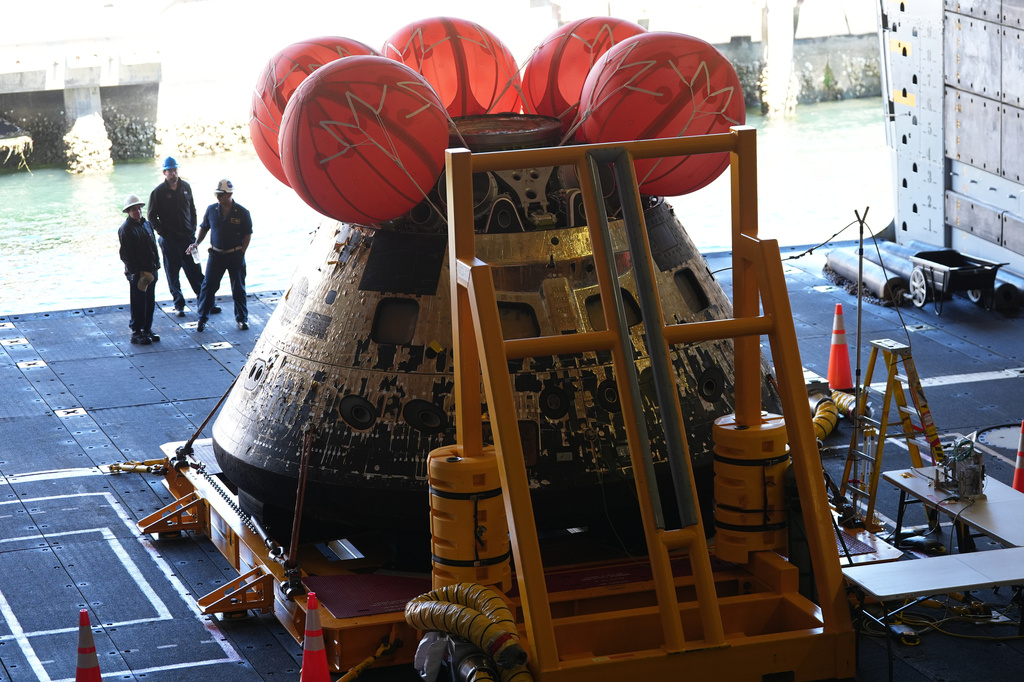NASA's Artemis II capsule is seen aboard the USS John P. Murtha at Naval Base San Diego Saturday, April 11, 2026, in San Diego. (AP Photo/Gregory Bull)