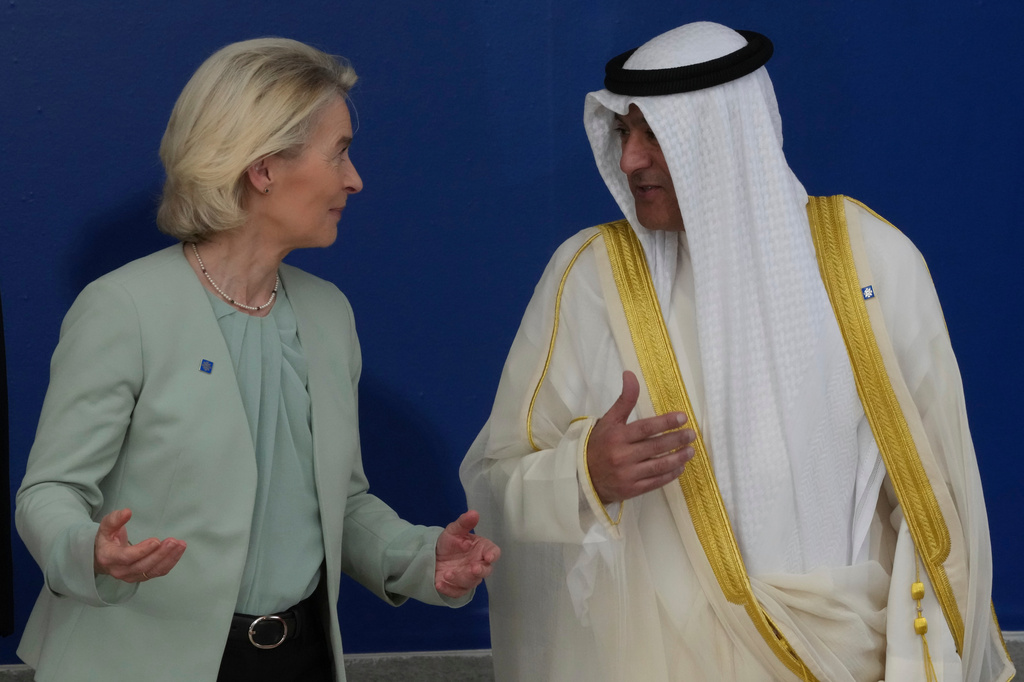 European Commission President Ursula von der Leyen, left, speaks with the Gulf Cooperation Council Secretary General Jasem Mohamed Albudaiwi before a family photo of the EU Summit in Nicosia, Cyprus, Friday, April 24, 2026. (AP Photo/Petros Karadjias)