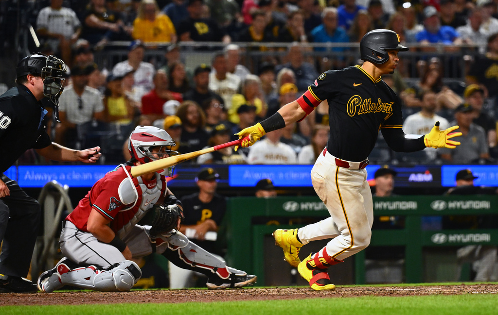 Pittsburgh Pirates' Endy Rodríguez hits an RBI single off of Arizona Diamondbacks pitcher Ryan Thompson during the eighth inning of a baseball game in Pittsburgh, Tuesday, July 28, 2026. (AP Photo/Justin Berl)