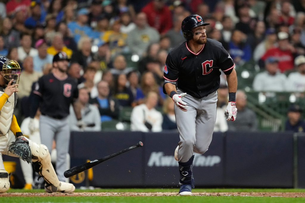 Cleveland Guardians' Daniel Schneemann drops his bat after hitting a grand slam during the fourth inning of a baseball game against the Milwaukee Brewers, Wednesday, June 17, 2026, in Milwaukee. (AP Photo/Aaron Gash)