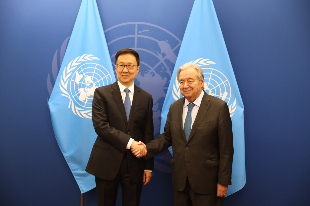 Chinese Vice President Han Zheng, left, shakes hands with United Nations Secretary-General Antonio Guterres during the 81st session of the United Nations General Assembly at United Nations headquarters, Friday, Sept. 25, 2026. (AP Photo/Heather Khalifa)