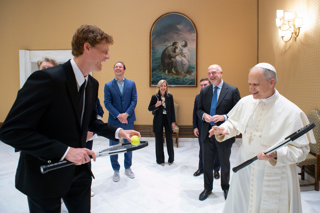 FILE - Italy's Jannik Sinner, left, shares a light moment with Pope Leo XIV on the occasion of their meeting at the Vatican, May 14, 2025. (Vatican Media via AP, File)