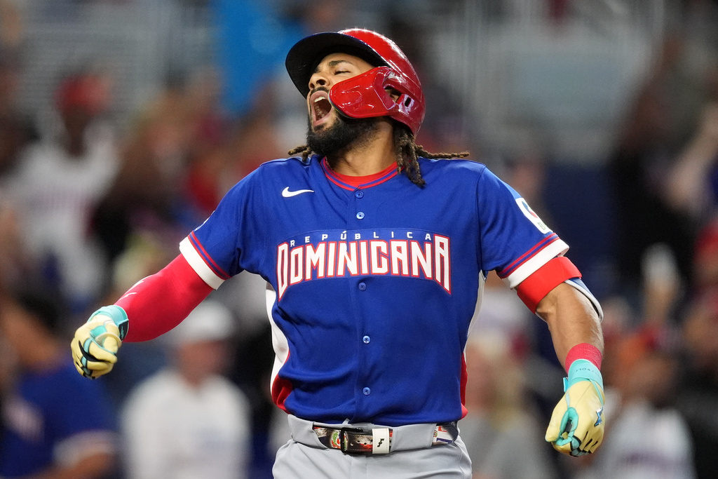 Dominican Republic's Fernando Tatis Jr. reacts after hitting a grand slam during the second inning of a World Baseball Classic game against Israel, Monday, March 9, 2026, in Miami. (AP Photo/Rebecca Blackwell)
