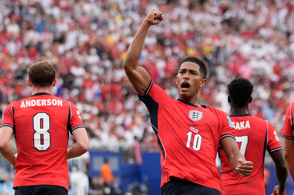 England's Jude Bellingham (10) celebrates after scoring their first goal during the World Cup Group L soccer match between Panama and England in East Rutherford, N.J., near New York, Saturday, June 27, 2026. (AP Photo/Steve Luciano)