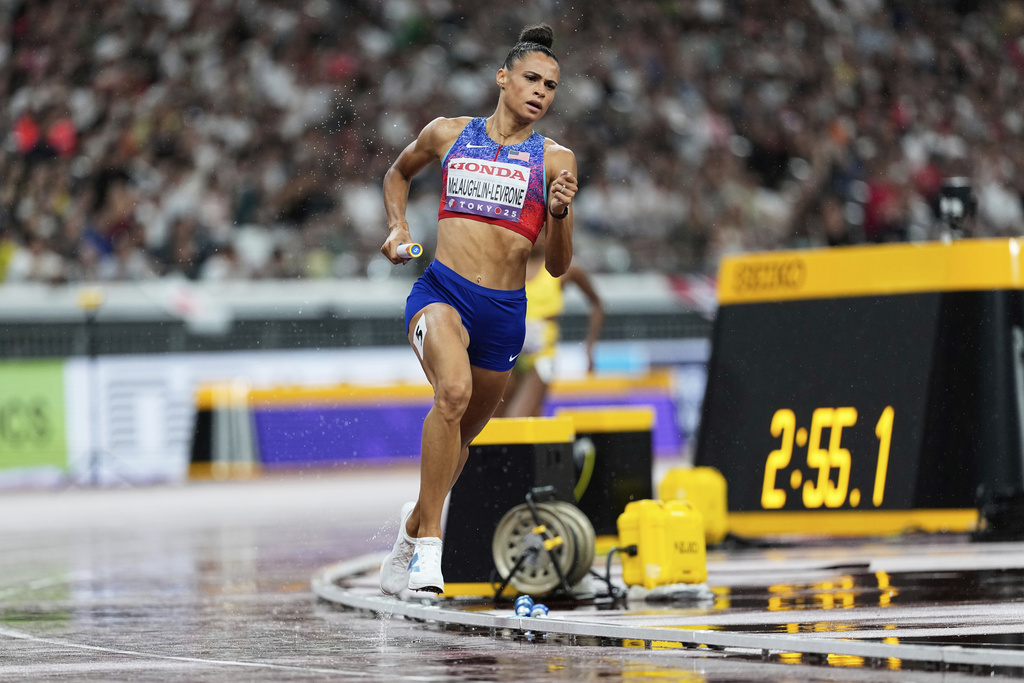 United States' Sydney McLaughlin-Levrone competes in the women's 4 X 400 meters relay at the World Athletics Championships in Tokyo, Sunday, Sept. 21, 2025. (AP Photo/Ashley Landis)