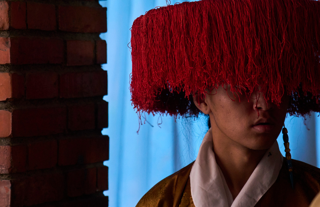 A Tibetan man gets ready to perform at a cultural show during the 91st birthday celebration of spiritual leader the Dalai Lama in Kathmandu, Nepal, Monday, July 6, 2026. (AP Photo/Niranjan Shrestha)