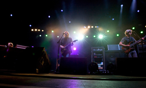 FILE - Phish band members Page McConnell, Trey Anastasio, Mike Gordon, from left, performs during their benefit concert at the Champlain Valley Exposition in Essex Junction, Vt, on Wednesday, Sept. 14, 2011. (AP Photo/Alison Redlich, File) FILE - Phish band members Page McConnell, Trey Anastasio, Mike Gordon, from left, performs during their benefit concert at the Champlain Valley Exposition in Essex Junction, Vt, on Wednesday, Sept. 14, 2011. (AP Photo/Alison Redlich, File)