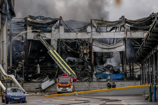 A firefighter works to extinguish a fire at a warehouse following a Russian attack, Saturday, Oct. 25, 2025, in Kyiv, Ukraine. (AP Photo/Julia Demaree Nikhinson) A firefighter works to extinguish a fire at a warehouse following a Russian attack, Saturday, Oct. 25, 2025, in Kyiv, Ukraine. (AP Photo/Julia Demaree Nikhinson)