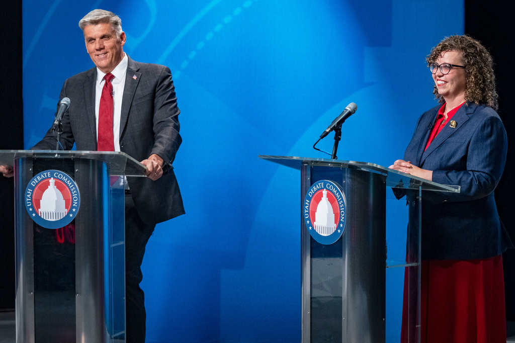 Candidates Phil Lyman and Celeste Maloy smile at the end of the 3rd Congressional District GOP primary debate in Salt Lake City, Utah, on Monday, June 1, 2026. (Rick Egan/The Salt Lake Tribune via AP, Pool)