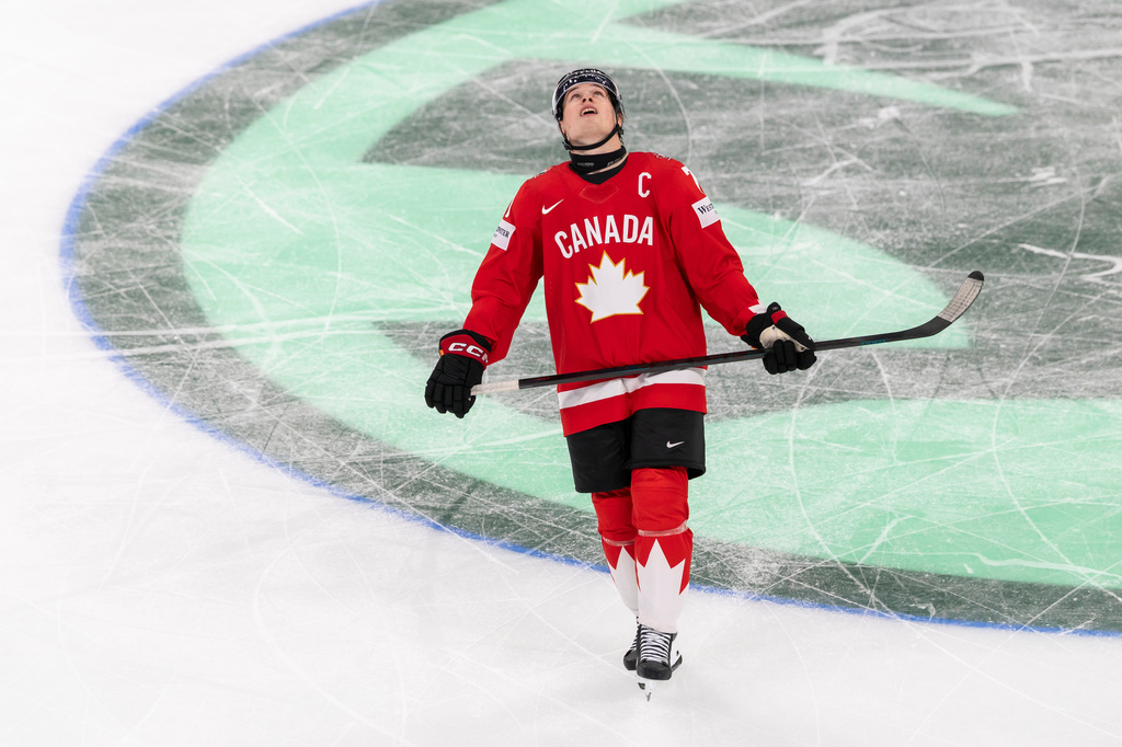 Canada's Macklin Celebrini reacts during the semifinal game between Finland and Canada at the men's ice hockey world championship, Saturday, May 30, 2026, in Zurich, Switzerland. (Cyril Zingaro/Keystone via AP)