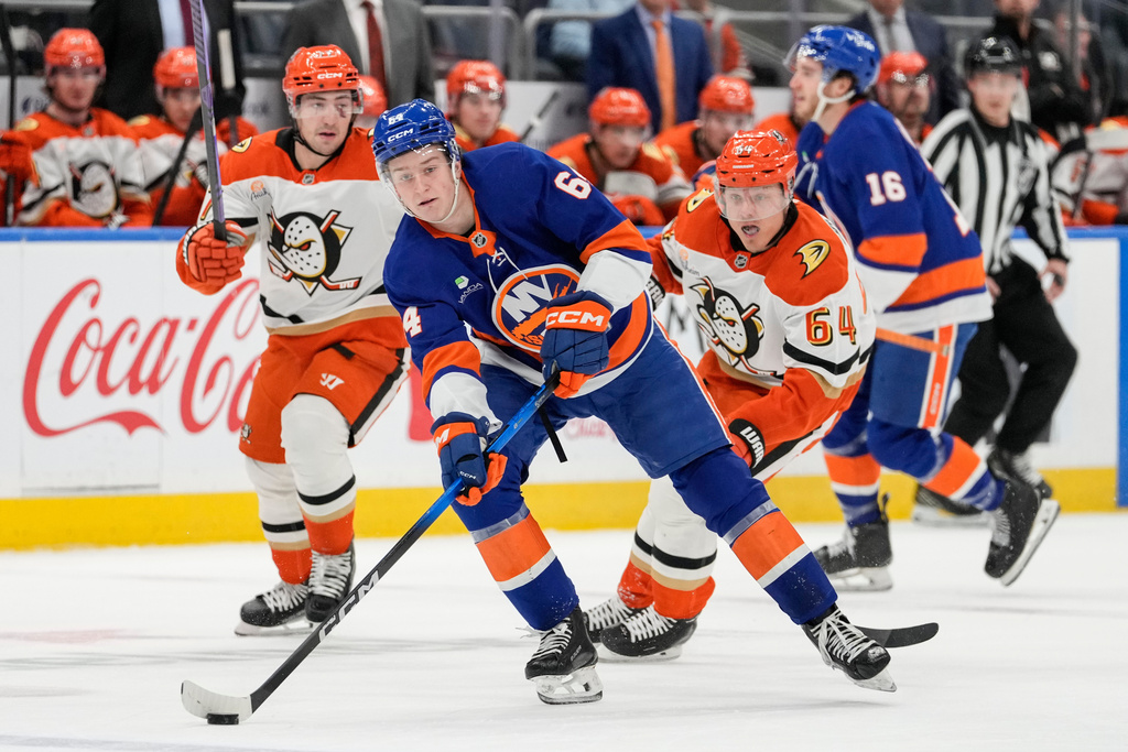 New York Islanders center Calum Ritchie (64) looks to pass during the second period of an NHL hockey game against Anaheim Ducks, Thursday, Dec. 11, 2025, in Elmont, N.Y. (AP Photo/Yuki Iwamura)