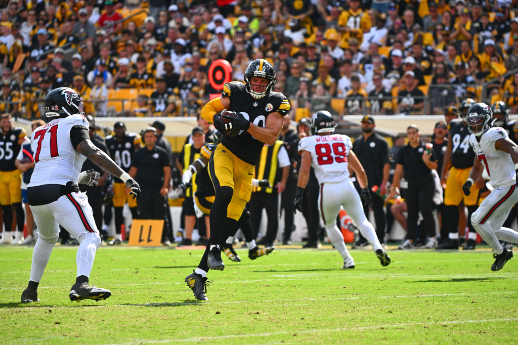 Pittsburgh Steelers outside linebacker T.J. Watt (90) intercepts a pass during an NFL football game against the Atlanta Falcons, Sunday, Sept. 13, 2026, in Pittsburgh. (AP Photo/Justin Berl)