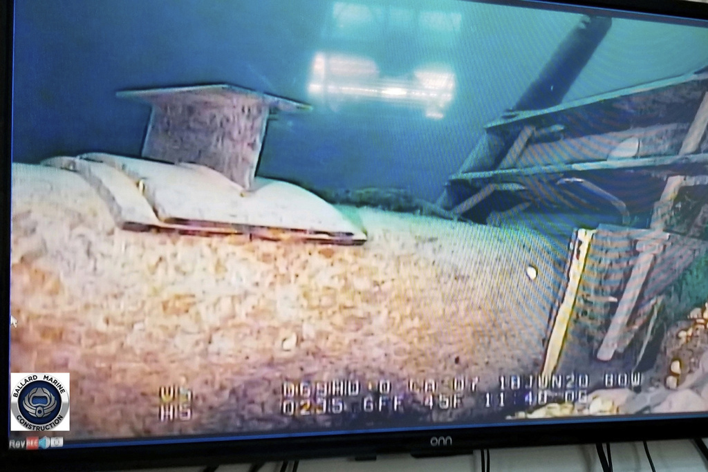FILE - This photo provided by the Michigan Department of Environment, Great Lakes, and Energy in June 2020 shows damage to anchor support EP-17-1 on the east leg of the Enbridge Line 5 pipeline in the Straits of Mackinac in Michigan, displayed on a television screen. (Michigan Department of Environment, Great Lakes, and Energy via AP, File)