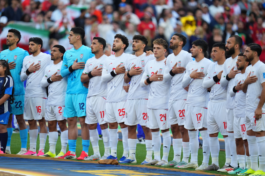 Iran's team stands for their national anthem during the World Cup Group G soccer match between Egypt and Iran in Seattle, Friday, June 26, 2026. (AP Photo/Manu Fernandez)