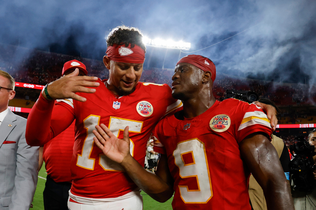 Kansas City Chiefs quarterback Patrick Mahomes (15) and running back Kenneth Walker III (9) walk off the field after an NFL football game against the Indianapolis Colts in Kansas City, Mo., Sunday, Sept. 20, 2026. (AP Photo/Colin E. Braley)