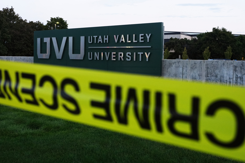 FILE - Crime scene tape surrounds Utah Valley University after Turning Point USA CEO and co-founder Charlie Kirk was shot and killed, Sept. 13, 2025, in Orem, Utah. (AP Photo/Lindsey Wasson, File)