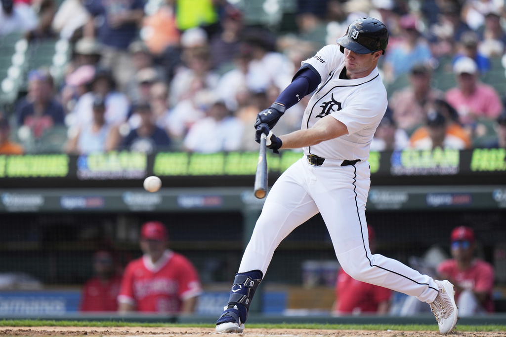 Detroit Tigers designated hitter Colt Keith hits a single during the fourth inning of a baseball game against the Los Angeles Angels, Sunday, Aug. 10, 2025, in Detroit. (AP Photo/Ryan Sun)