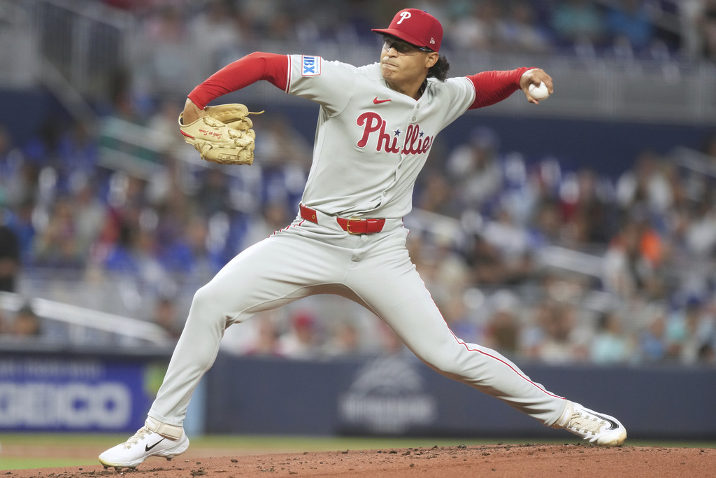 Philadelphia Phillies starting pitcher Jesús Luzardo aims a pitch during the first inning of a baseball game against the Miami Marlins Saturday, Sept. 6, 2025, in Miami. (AP Photo/Marta Lavandier)