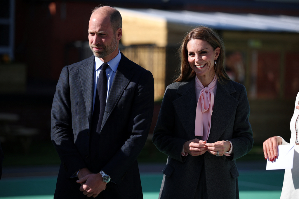 Britain's Prince William, left, and Kate, Princess of Wales visit Churchtown Primary School, Southport, England, Tuesday Sept. 23, 2025. (Phil Noble/Pool Photo via AP)
