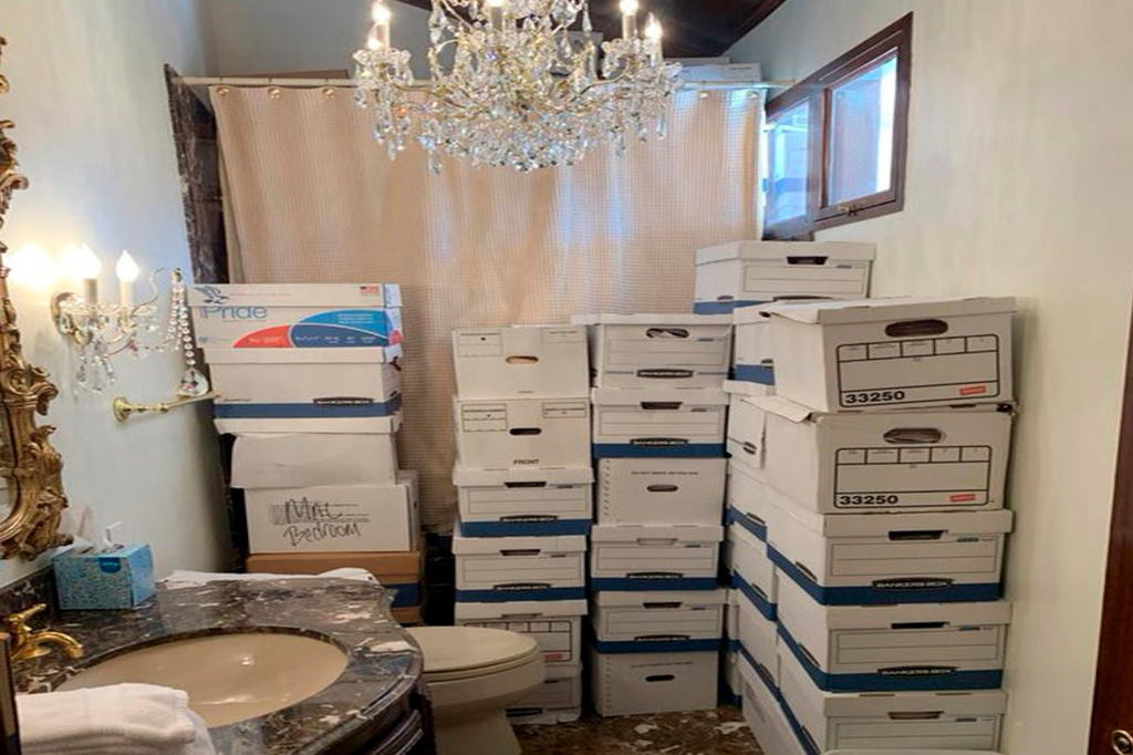 FILE - This image, contained in the indictment against former President Donald Trump, shows boxes of records stored in a bathroom and shower in the Lake Room at Trump's Mar-a-Lago estate in Palm Beach, Fla. (Justice Department via AP)