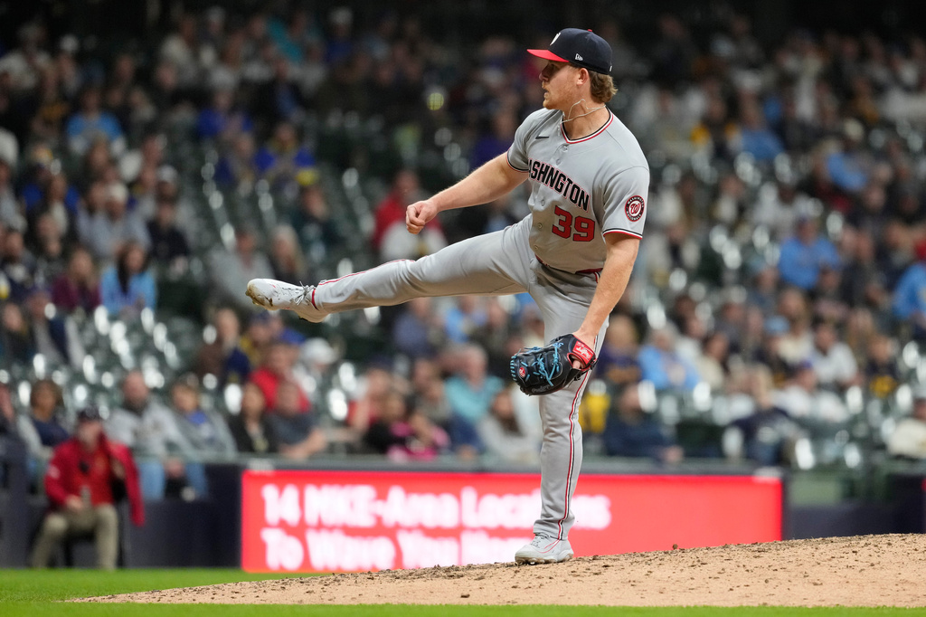 Washington Nationals' Clayton Beeter pitches during the ninth inning of a baseball game against the Milwaukee Brewers, Saturday, April 11, 2026, in Milwaukee. (AP Photo/Aaron Gash)
