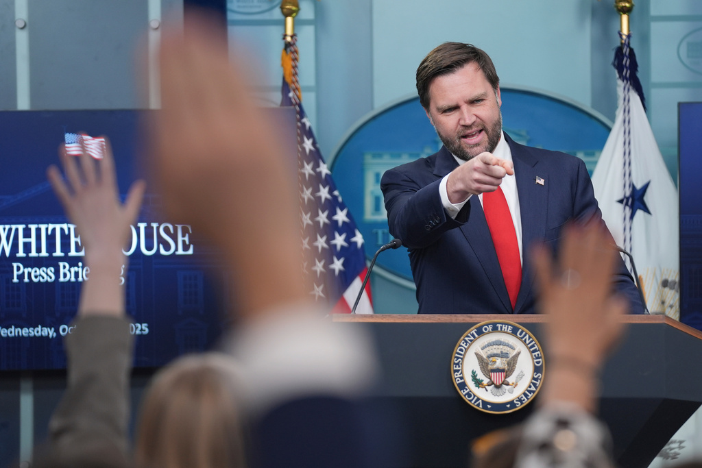 Vice President JD Vance, gestures while speaking with reporters in the James Brady Press Briefing Room at the White House, Wednesday, Oct. 1, 2025, in Washington. (AP Photo/Evan Vucci)