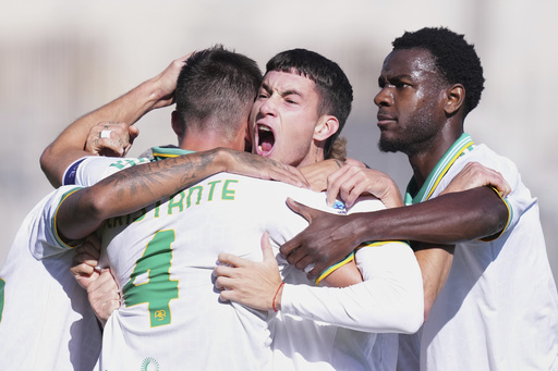 Roma's Bryan Cristante, back to camera, celebrates with teammates after scoring their side's second goal during a Serie A soccer match between Fiorentina and Roma at the Artemio Franchi stadium in Florence, Italy, Sunday, Oct. 5, 2025. (Alfredo Falcone/LaPresse via AP) Roma's Bryan Cristante, back to camera, celebrates with teammates after scoring their side's second goal during a Serie A soccer match between Fiorentina and Roma at the Artemio Franchi stadium in Florence, Italy, Sunday, Oct. 5, 2025. (Alfredo Falcone/LaPresse via AP)