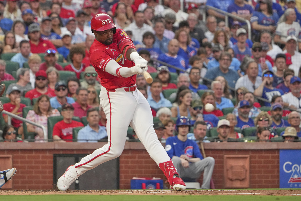 St. Louis Cardinals' Jordan Walker hits an RBI single during the second inning of a baseball game against the Chicago Cubs Friday, Aug. 8, 2025, in St. Louis. (AP Photo/Jeff Roberson)