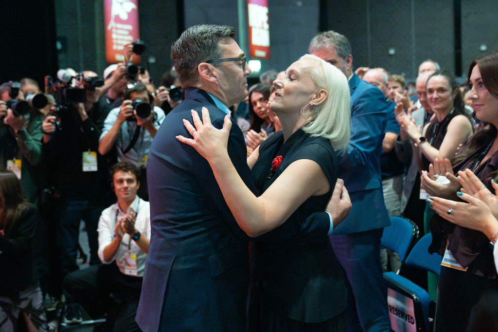 Britain's Prime Minister Andy Burnham embraces his wife Marie France Van Heel after delivering his keynote speech at the Labour Party Conference, in Liverpool, England, Tuesday, Sept. 29, 2026. (Stefan Rousseau/Pool Photo via AP)