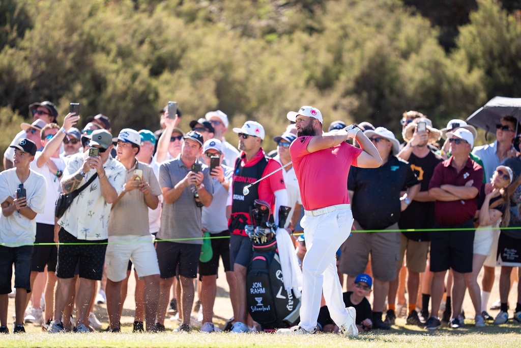 Captain Jon Rahm of Legion XIII hits his shot from the 13th fairway during the third round of the LIV Golf tournament at Grange Golf Club, Saturday, Feb 14, 2026 in Adelaide, Australia. (Mateo Villalba/LIV Golf via AP)