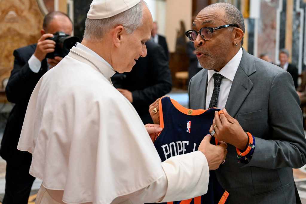 Pope Leo XIV meets with Spike Lee during an audience with and stars directors from the cinema at the Vatican, Saturday, Nov. 15, 2025. (Vatican Media Via AP)